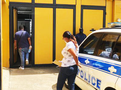 Police at the scene of the double murder. Photo: Robert Taylor