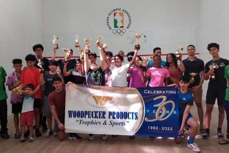 The various winners of the respective categories pose with their trophies. At left is Robert Fernandes