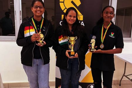 Three champions! From left Pooja Lam, Sasha Shariff and Jessica Callender, the future of Guyana’s women’s chess. They all excelled at the GAICO Grand Prix 2 at the National Stadium, Providence, last week.
