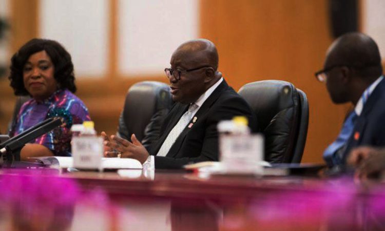 Ghana’s President Nana Akufo-Addo (C) speaks to Chinese leader Xi Jinping (not pictured) during their meeting at the Great Hall of the People in Beijing on Sept. 1, 2018. (Nicolas Asfouri/AFP/Getty Images)
