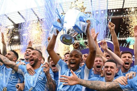 Manchester City celebrating after winning the 2021-2022 English Premier League title on the final day