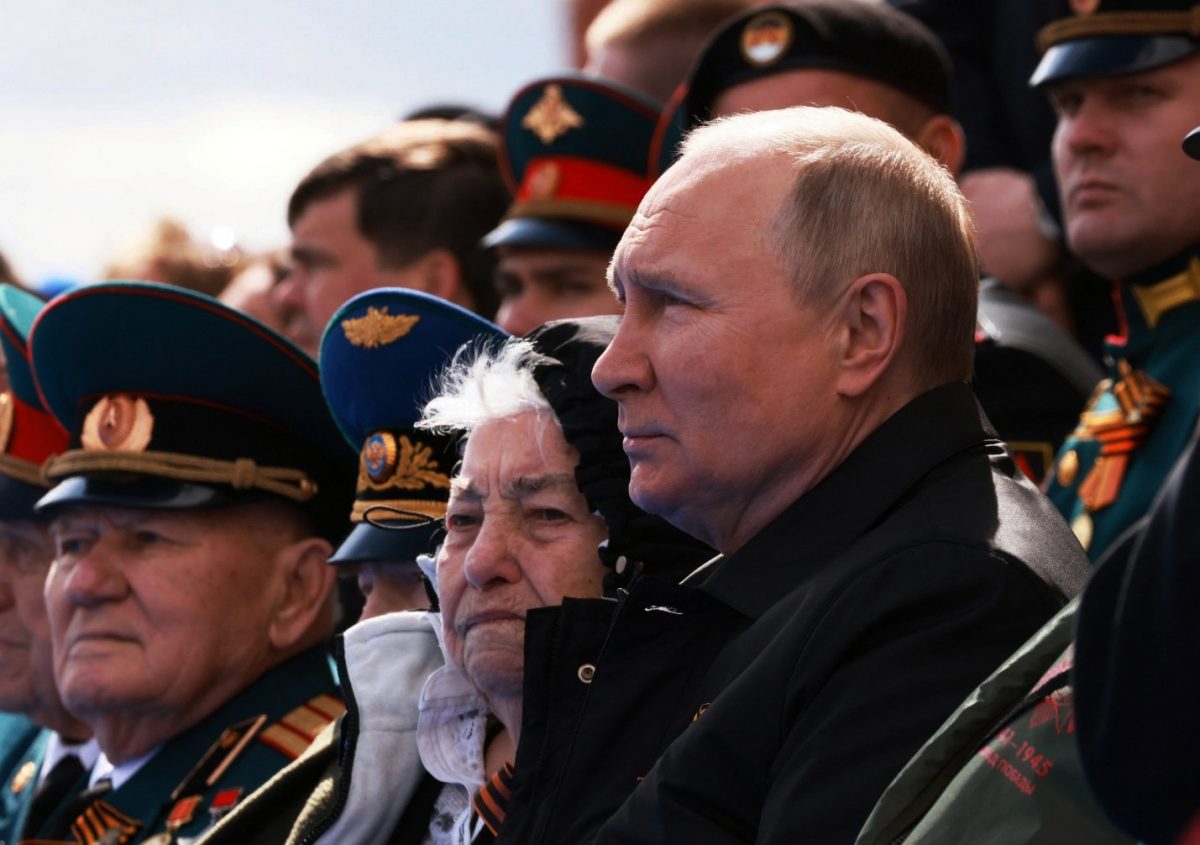 Russian President Vladimir Putin watches a military parade on Victory Day, which marks the 77th anniversary of the victory over Nazi Germany in World War Two, in Red Square in central Moscow, Russia May 9, 2022. (Sputnik/Mikhail Metzel/Pool via REUTERS)