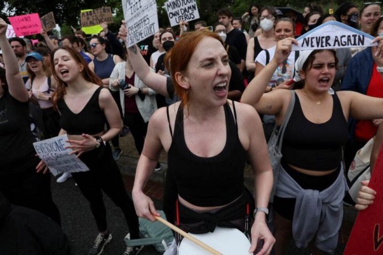 Abortion-rights protester Grace Lillis participates in nationwide pro-abortion rights demonstrations following the leaked Supreme Court opinion suggesting the possibility of overturning the Roe v. Wade abortion rights decision, in Washington, U.S., May 14, 2022. REUTERS/Leah Millis