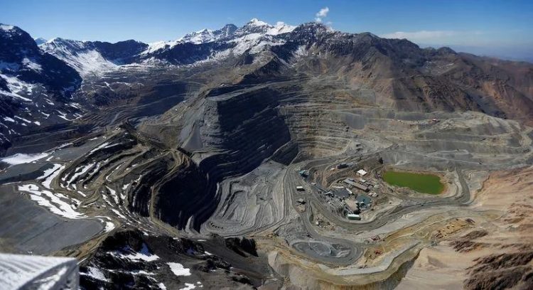 An aerial view of open pits of CODELCO's Andina and Anglo American's Los Bronces copper mines with Olivares glaciers in the background at Los Andes Mountain range (Reuters photo)