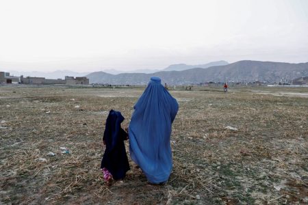 An Afghan woman clad in burqa walks in the early morning in Kabul, Afghanistan September 2, 2019.REUTERS/Mohammad Ismail