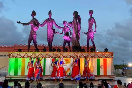Arrival Day 2022: A dance by the Guyana Hindu Dharmic Sabha yesterday in the backdrop of the Indian Arrival Monument at Palmyra, Corentyne. (Guyana Hindu Dharmic Sabha photo)