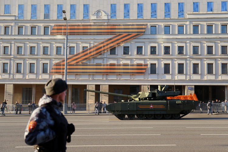 Russian service members drive a tank along a street during a rehearsal for the Victory Day military parade in Moscow, Russia May 4, 2022.
Image: REUTERS/Evgenia Novozhenina/File Photo