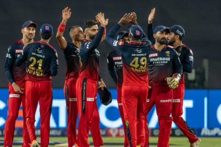 The Royal Challengers Bangalore (RCB) players celebrate their 13-run defeat of Chennai Super Kings yesterday in the TATA Indian Premier League (IPL) at the Maharashtra Cricket Association Stadium in Pune.