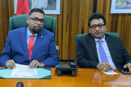 President Irfaan Ali (left) and Attorney General Anil Nandlall SC in this screenshot from the video statement.