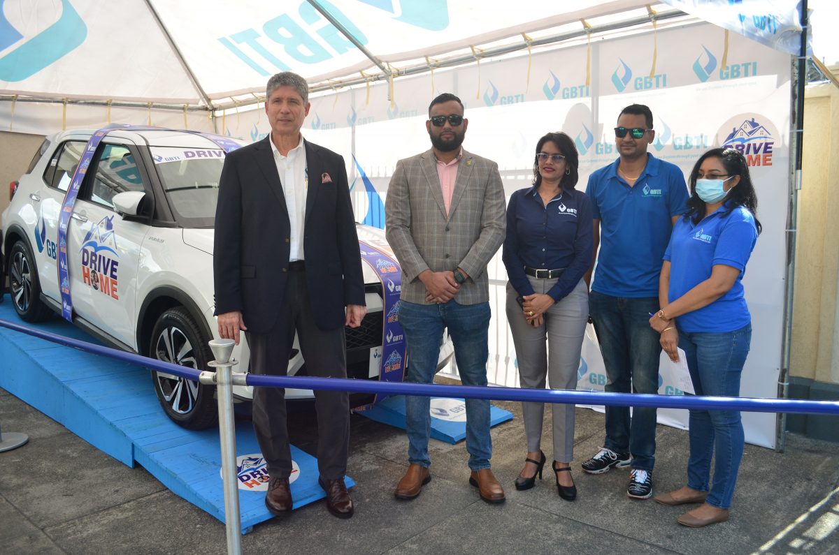 From left, Chief Executive Officer of GBTI James Foster, Permanent Secretary of the Ministry of Housing and Water Andre Ally, GBTI Business Development Manager Rawattie Mohandeo and bank staffers