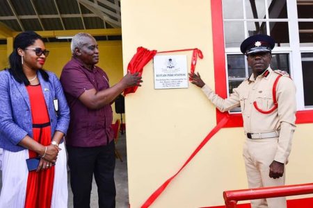 Minister of Home Affairs, Robeson Benn (second from left) and Fire Chief (ag), Gregory Wickham (right) unveiled the plaque at the commissioning of the Eccles Fire station. (DPI photo)