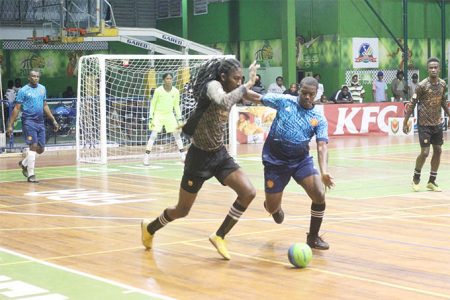 Jamal Pedro, left, is one of several players suspended by the Guyana Football Federation for participating in an unsanctioned tournament.