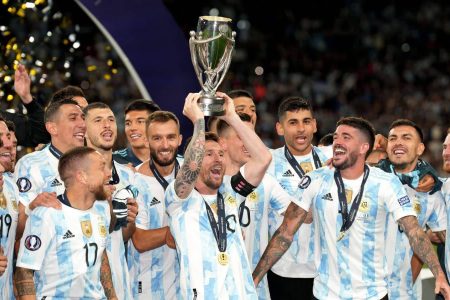 Lionel Messi, captain of Argentina celebrating with teammates after defeating Italy 3-0 to claim the ‘Finalissima’