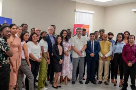 The 30 new Young influencers who were inducted at the ceremony on Saturday along with Minister of Human Service and Social Security Dr Vindhya Persaud (at centre) and foreign envoys 