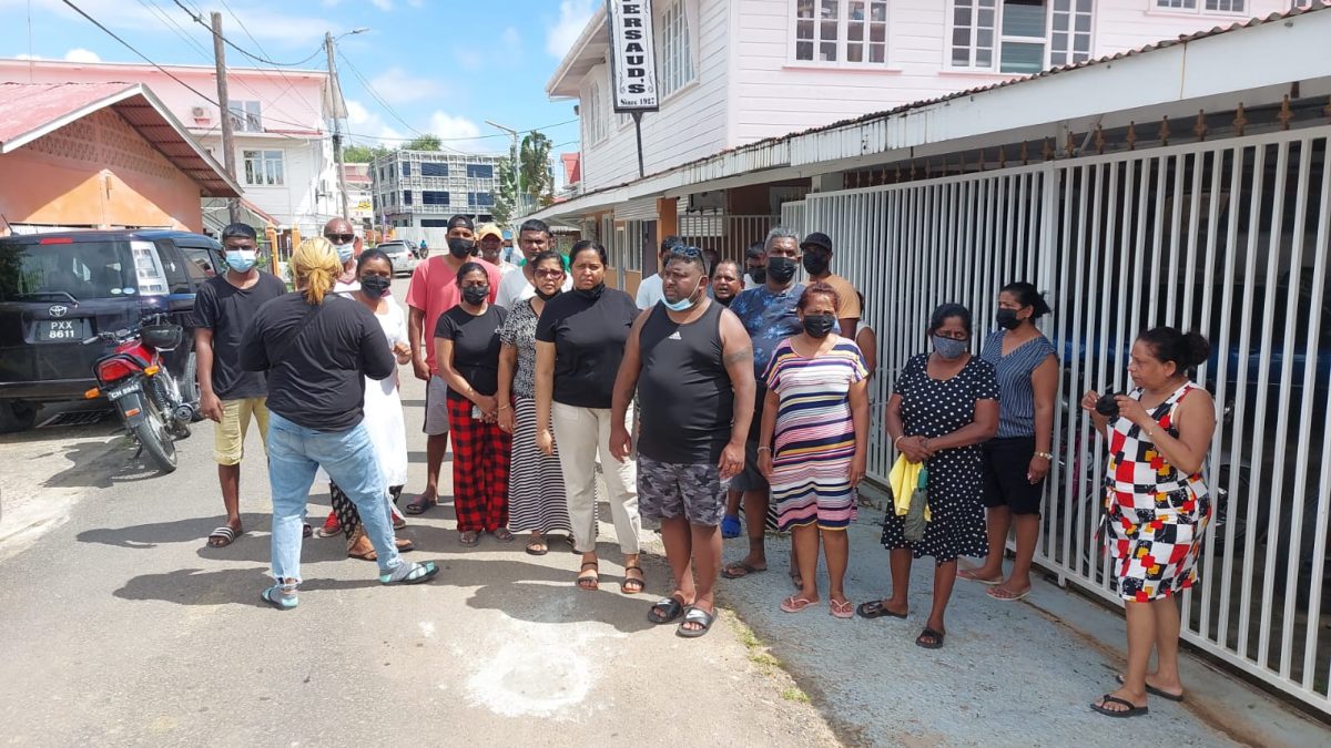 The family of Mohabir Ragasammy in front of the Persaud Funeral Home