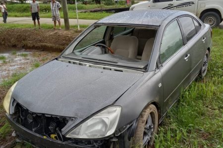 The stolen car which was recovered after being stripped and sprayed over in black