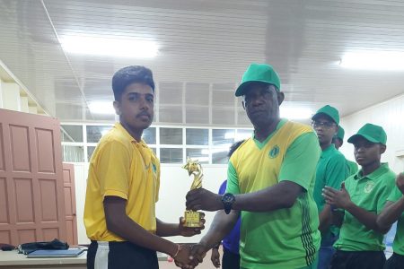Man of the Match, Gulcharran Chuli receives his award from Orin Bailey