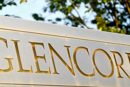 FILE PHOTO: The logo of commodities trader Glencore is pictured in front of the company's headquarters in Baar, Switzerland, July 18, 2017.  REUTERS/Arnd Wiegmann/File Photo