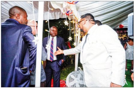 FLASHBACK – President Irfaan Ali (right) and Leader of the Opposition Aubrey Norton during their encounter at the British High Commission’s reception. 