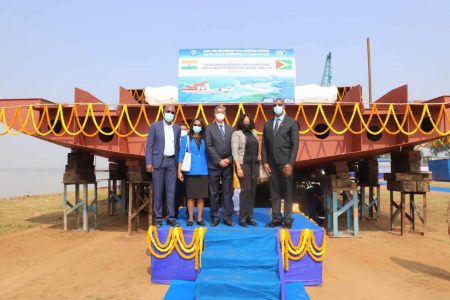 Officials of the Indian company and from Guyana at the launching of the keel in November last year. (Ministry of Public Works photo)
