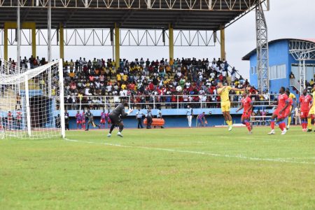 Golden Jaguars Tre Metford (centre) misses an attempted header against Haiti following a cross into the penalty box at the National Track and Field Centre, Leonora in the Concacaf Nations League 