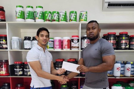 Recently, owner of Guyana’s leading gym equipment and supplement supplier, Jamie McDonald presented a sponsorship cheque to Organizing Secretary of the GBBFFI, Videsh Sookram for the staging of the Mr Berbice bodybuilding championships.
