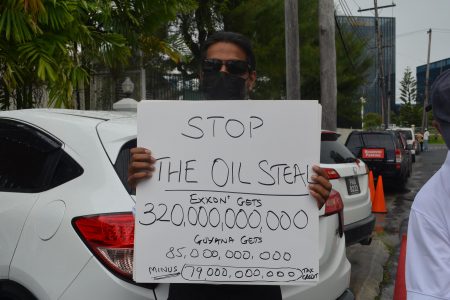 Yog Mahadeo protesting outside of the Natural Resources Ministry last week (Orlando Charles photo)