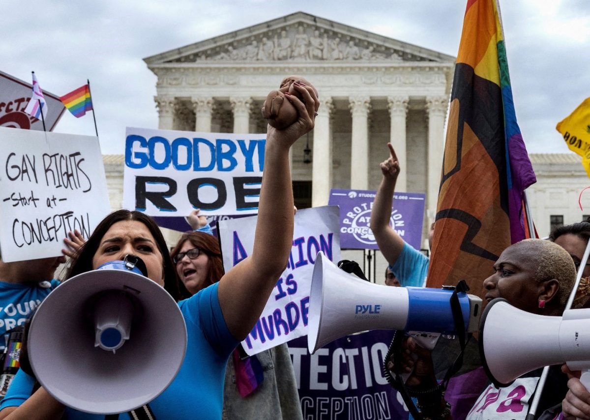 Abortion rights supporters and anti-abortion demonstrators protest outside the United States Supreme Court in Washington, U.S., June 21, 2022. REUTERS/ Evelyn Hockstein