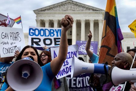 Abortion rights supporters and anti-abortion demonstrators protest outside the United States Supreme Court in Washington, U.S., June 21, 2022. REUTERS/ Evelyn Hockstein