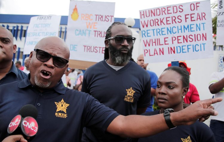 OWTU representative Neil Mc Eachnie, of Unilever Caribbean Limited, speaks about mass retrenchment plans during a protest outside the company on the Eastern Main Road, Champs Fleurs, in 2019. (ABRAHAM DIAZ)