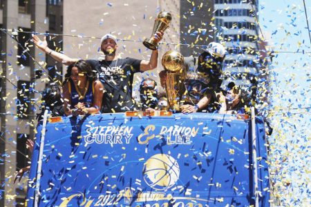 Golden State Warriors guard Stephen Curry (30) gestures during the Golden State Warriors championship parade in downtown San Francisco. Mandatory Credit: Darren Yamashita-USA TODAY Sports.