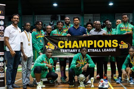 The University of Guyana (UG) team posing with their spoils after winning the inaugural Youth Basketball
Guyana ‘Tertiary League’ on Sunday at the Cliff Anderson Sports Hall, Homestretch Avenue.
