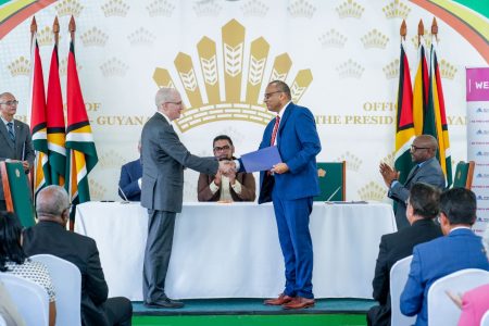 The signing   today (Office of the President photo)