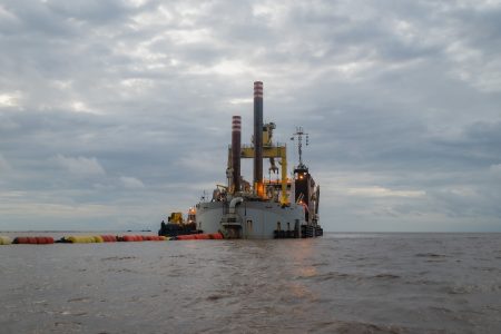 Dredge – The Zeng He cutter suction hopper dredger at the mouth of the Demerara River (Team Mohamed’s photo) 