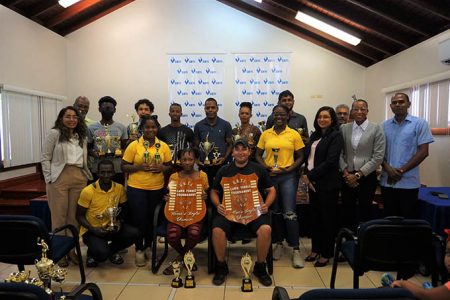 GBTI and GTA officials pose with the winners of the various categories of the tournament on Tuesday during the closing ceremony
