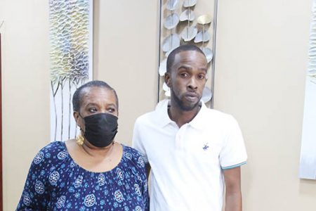 Flashback 2021: Akili Charles and his mother Melania Charles at attorney Ganesh Saroop’s office in Port-of-Spain.

