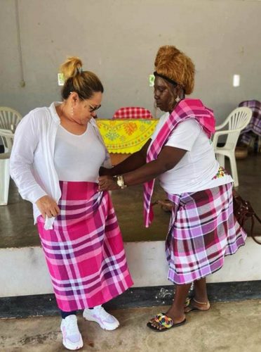 Jude Da Silva being clothed with a symbol of a matured woman by a member of the Samaaka people in Brownsburg, Suriname recently