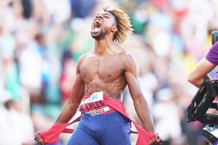 Noah Lyles celebrates after successfully defending his 200m title at the world athletics championship