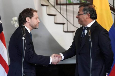 U.S. Deputy National Security advisor Jonathan Finer and Colombia’s President-elect Gustavo Petro shake hands after a meeting, in Bogota, Colombia July 22, 2022. (REUTERS/Nathalia Angarita photo) 