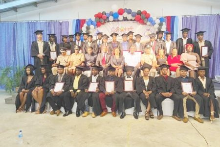 The 29 Police Ranks who graduated from the six-month Prosecutors Course last Friday along with government officials and senior members of the force. 