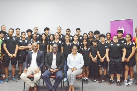 The Guyana Junior CASA team posing alongside (sitting from left) GSA Vice-President David Fernandes, Director of Sport Steve Ninvalle, and Digicel Communications Director Vidya Sanichara