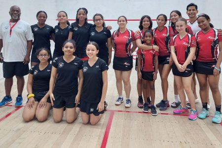 Guyana’s Girls Team (left) posing with T&T Girls Team before their matches