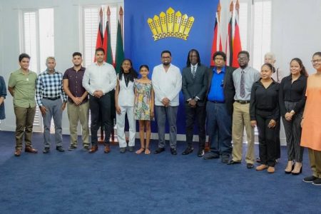 In the picture above President Ali, ninth from left and president of the GCF Frankie Farley, next to him, yesterday morning at State House along with Minister of Sport Charles Ramson Jnr., some executive members of the GCF and members of the Chess Olympiad team. (Photo Courtesy of the Guyana Chess Federation (GCF).