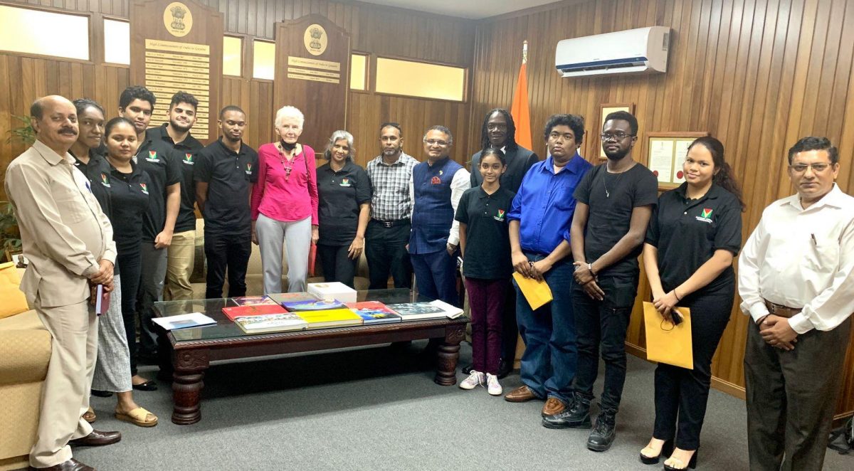 The members of the Guyana national chess team for the upcoming Chess Olympiad in India, pose with the India High Commissioner to Guyana Dr K. J. Srinivasa