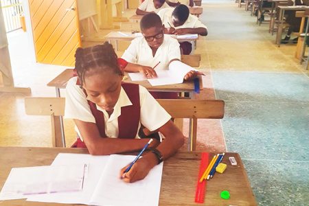 Day Two of the National Grade Six Assessment: Pupils at the Christianburg Primary School, Linden writing their exams. (Ministry of Education photo)