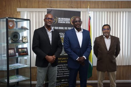 From left are: Junior Vice President of the Chamber,  Kester Hutson; Technical Director, Dr. Patrick Antoine, and Advisor to the Technical Director, Neville Bissember (GCCI photo)