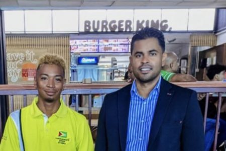 Guyana’s cycling representative at the Commonwealth Games, Christopher Griffith had a kodak moment with Minister of Sport, Charles Ramson Jr., while at the Cheddi Jagan International Airport. The talented cyclist was encouraged by the Minister to give  his best.
