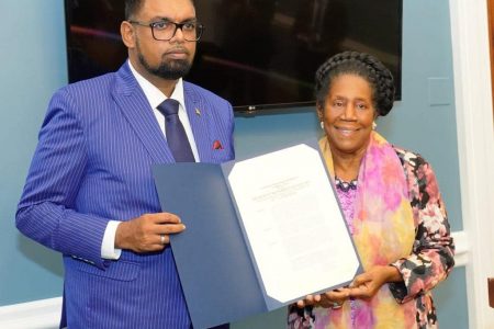 President Irfaan Ali (left) and Congresswoman Sheila Jackson-Lee with the certificate. (Office of the President photo)