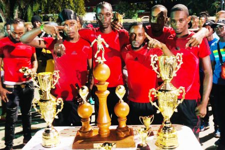 The victorious Lack Ah Scene unit poses with the spoils following the conclusion of the Mocha Village Cup Sunday night.