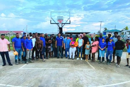 MISSION ACCOMPLISHED! The team from the Ministry of Culture, Youth and Sport pose for a photo opportunity after putting up basketball backboards at Ithaca, Berbice.
